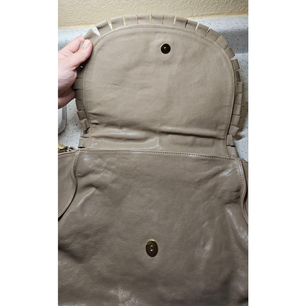 Charming Red(V) leather 2 way wear cross-body with a stylish fringe bow detail - Picture 11 of 12